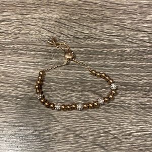 Gold, jeweled Michael Kors bracelet